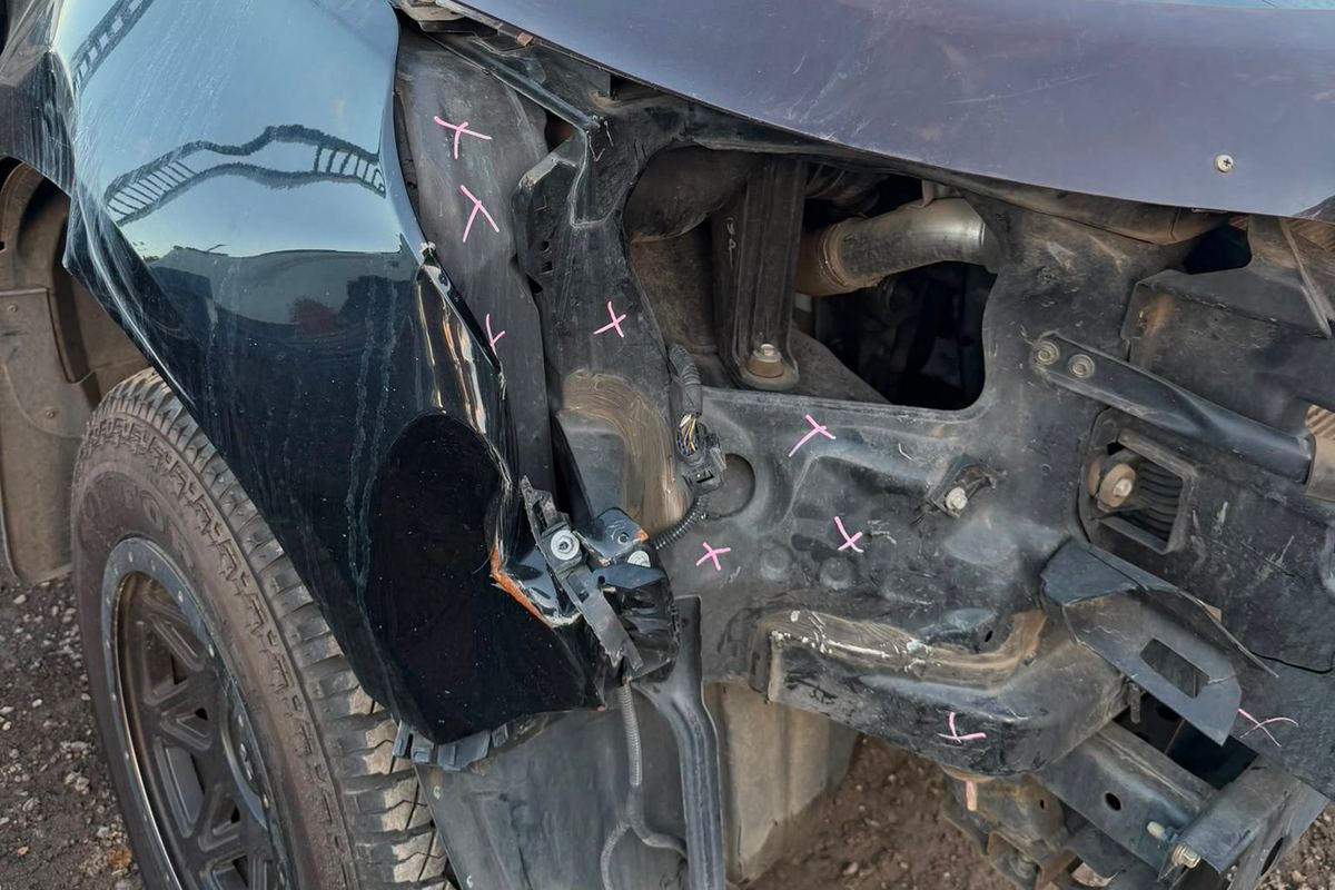 Before: Holden Colorado with front bar removed and guard torn after a collision